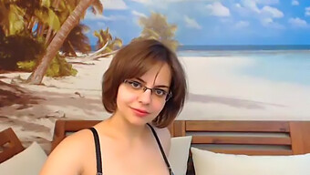 Glasses-Wearing Latina With Big Natural Tits Strips Down