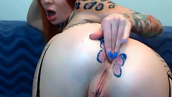 Inked Redhead Shows Off Her Butterfly Tattoo On Webcam